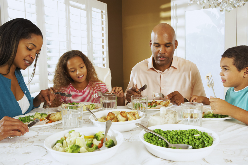 Family enjoying dinner at home